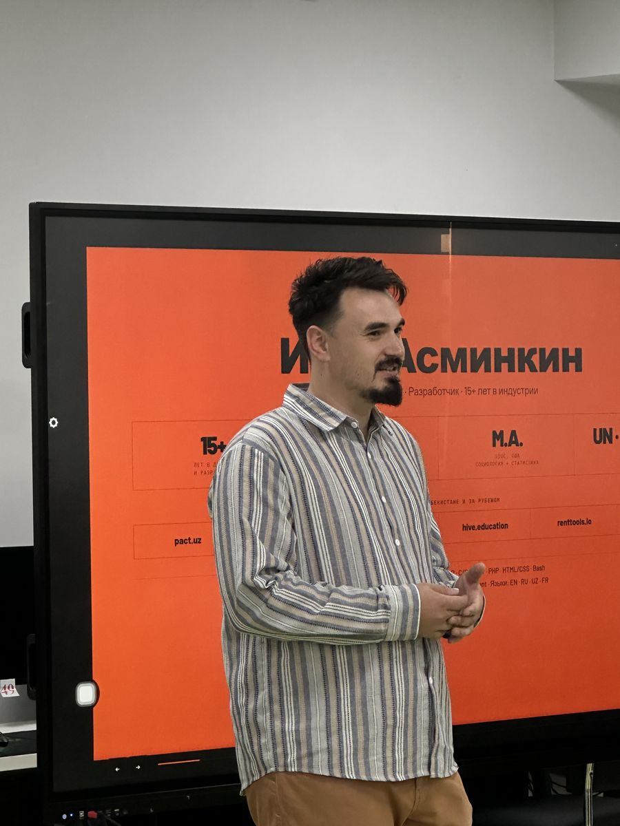 Ilya Asminkin speaking at a conference